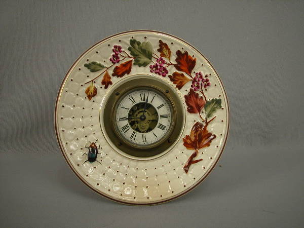 Majolica Avalon: Avalon beatle plate clock, 8 1/4"d, ref: Karmason-Stacke p. 168