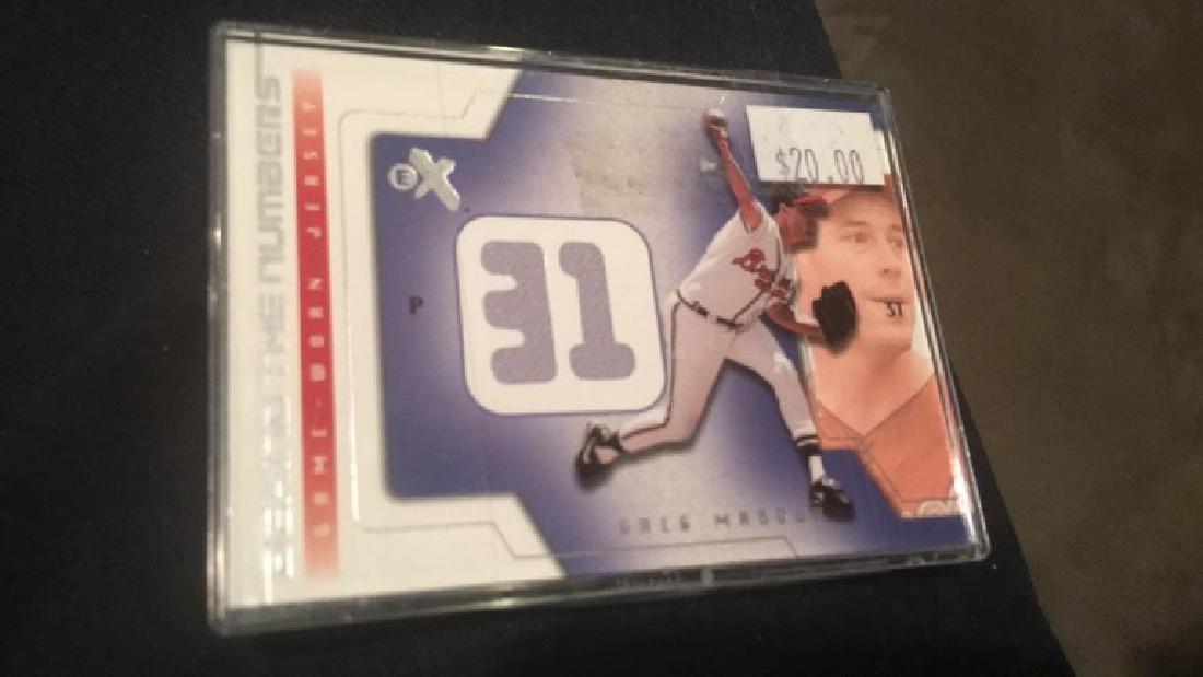 Greg Maddux 2002 fleer ex behind the numbers game: Greg Maddux 2002 fleer ex behind the numbers game