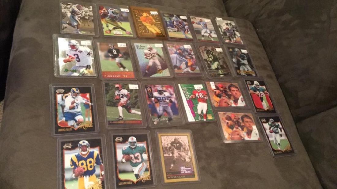 Huge football insert lot hi book value lots of: big names Barry Sanders natron means Marshall Faulk Steve McNair and more