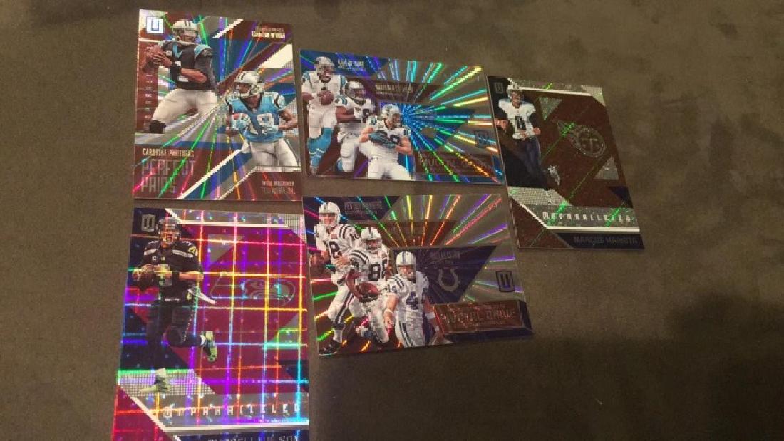 2016 unparalleled football a lot Kim Newton: perfect pairs and pivotal drive insert lot Russell Wilson Marcus Mariota Peyton Manning pivotal drive a lot