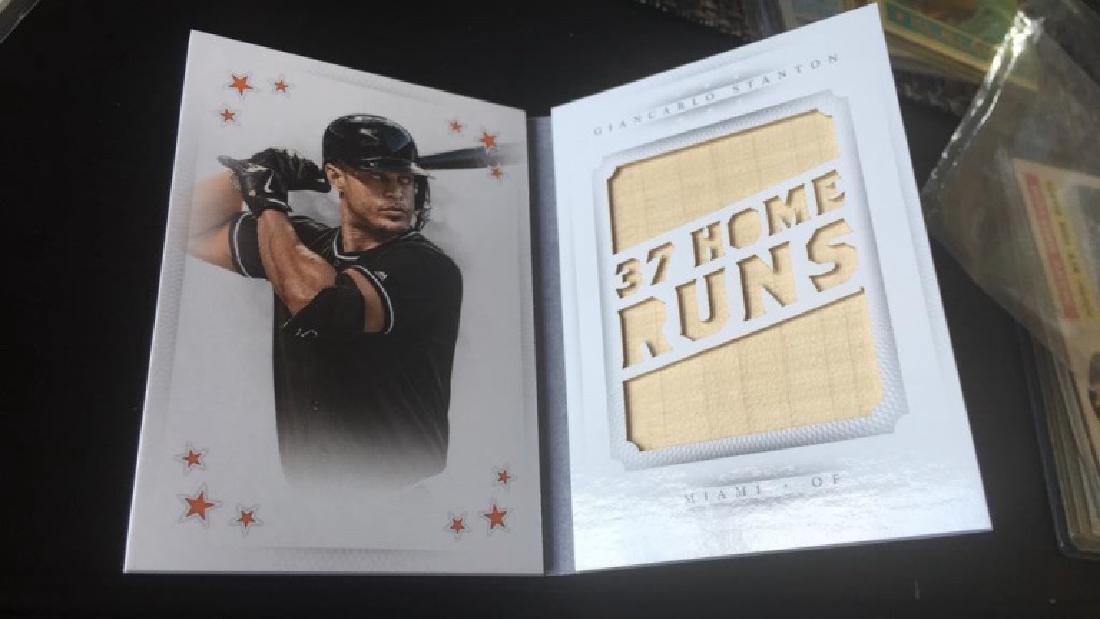 Giancarlo Stanton 2016 National Treasures booklet (1 of 3)