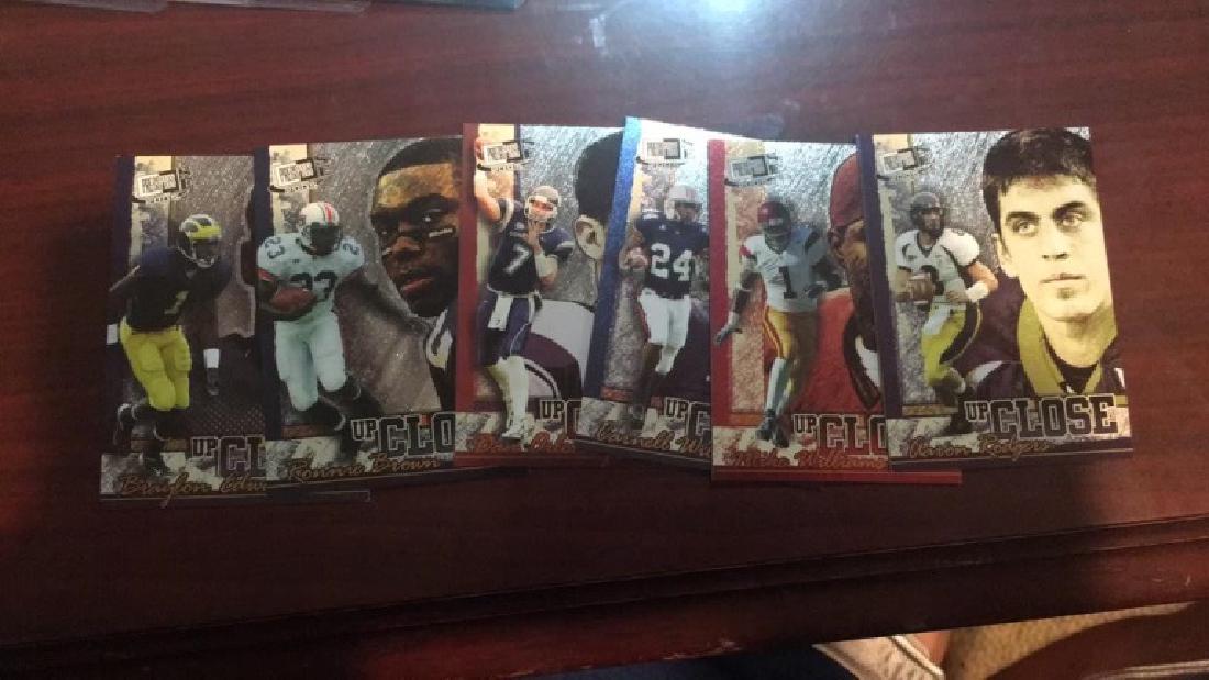 2005 press pass up close rookie set with Aaron (1 of 2)