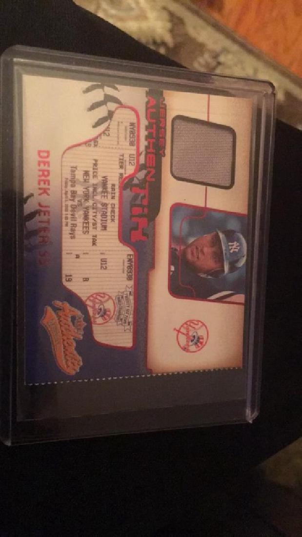 Derek Jeter Fleer Authentix jersey card (1 of 2)