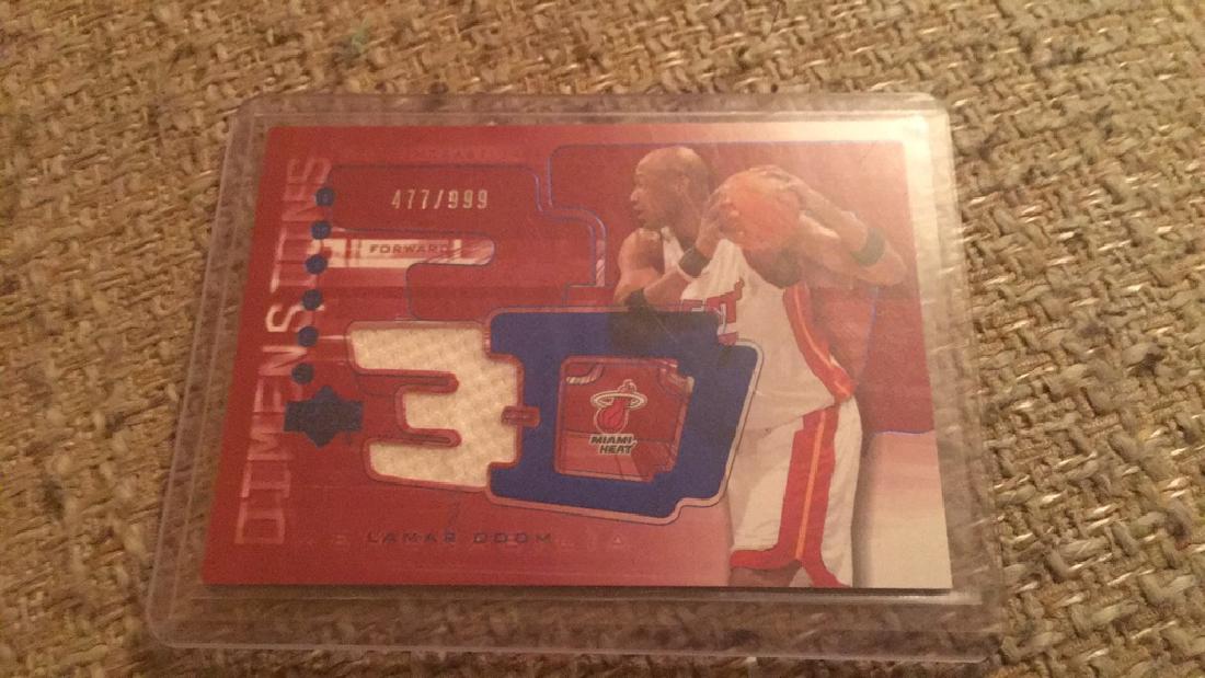 Alonzo Mourning triple dimensions jersey card (1 of 1)