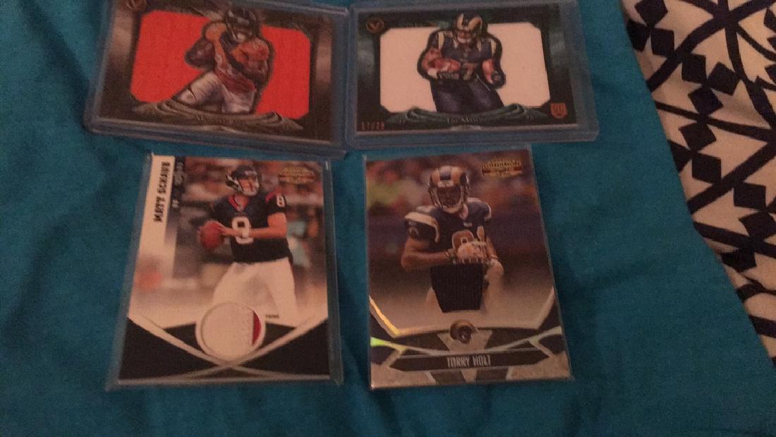 Four card football jersey patch lot three hole (1 of 3)