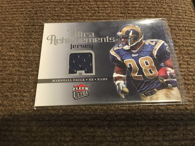Marshall Faulk 2006 Ultra Achievements Jersey Card: Marshall Faulk 2006 Ultra Achievements Jersey Card