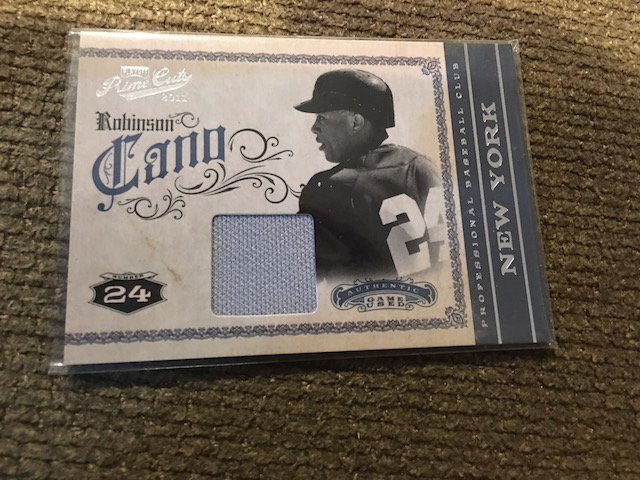 2011 PLAYOFF PRIME CUTS *ROBINSON CANO GW JERSEY #D/199 (1 of 2)