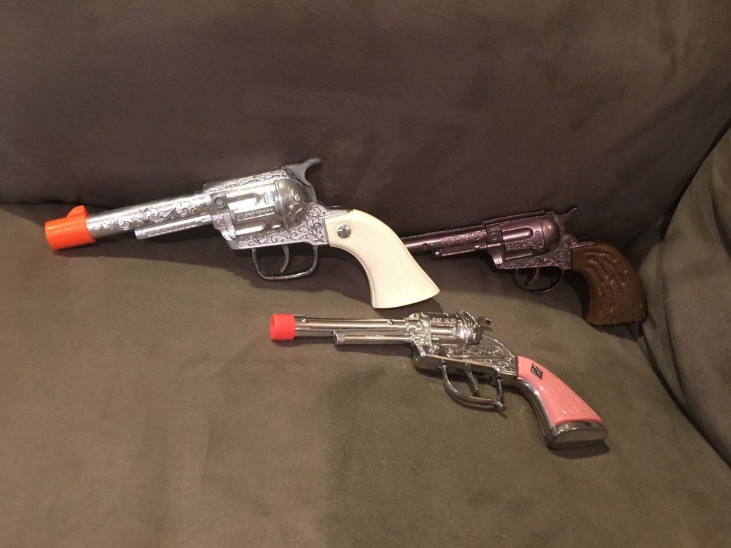 Lot of 3 Toy Cap Guns one with Pink Handle (1 of 3)