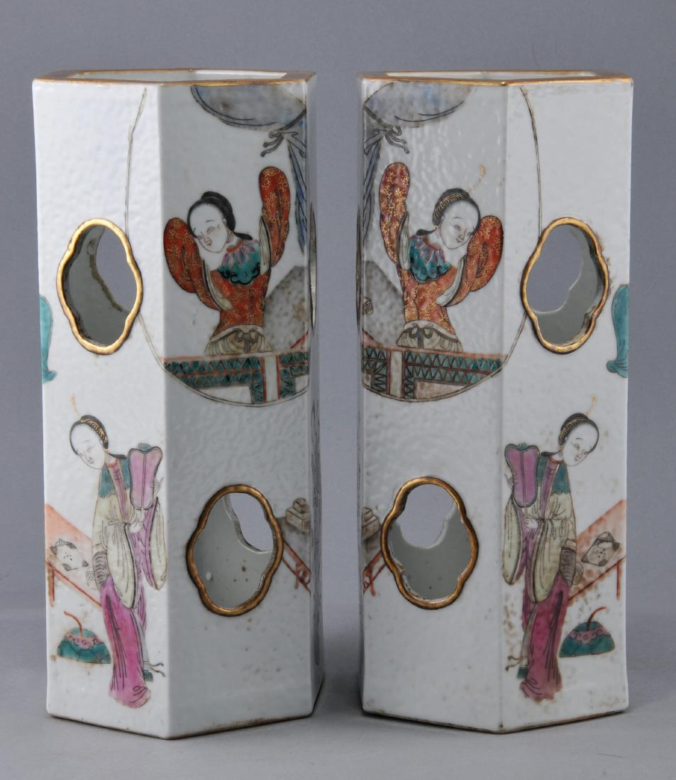 Pair of porcelain hat stands. Tung Chih mark: Pair of porcelain hat stands. Tung Chih mark (1861-1875) and of the period. Hexagonal form with pierced openings. Famille Rose decoration of women. 11" h. For additional and high-resolution images, pl