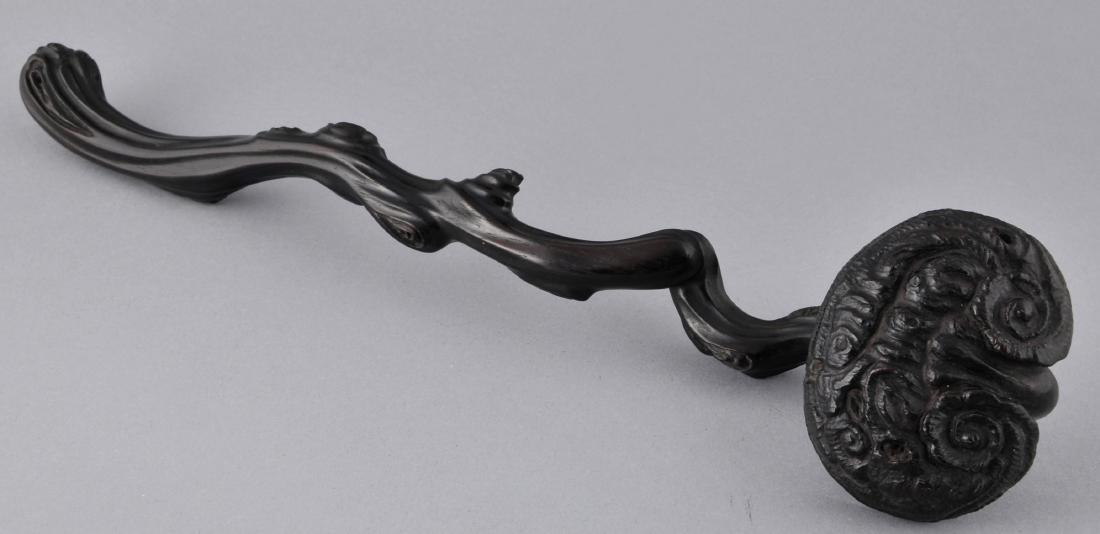 Rosewood scepter. China. 19th century. Carved in the: Rosewood scepter. China. 19th century. Carved in the form of a Ling Chih. 13" long. For additional and high-resolution images, please copy and paste the following link: https://www.dropbox.com/sh/cw53