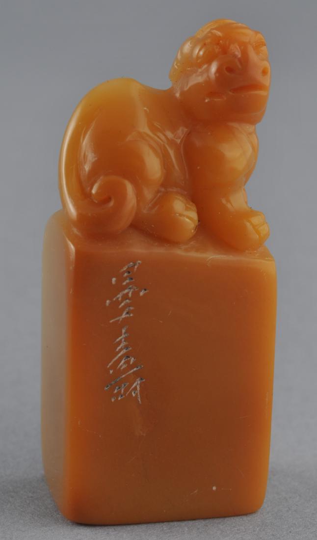 Soapstone Seal. Yellow wax colour. Chih Lung finial.: Soapstone Seal. Yellow wax colour. Chih Lung finial. Seal intact. 2" l. For additional and high-resolution images, please copy and paste the following link: https://www.dropbox.com/sh/cw53wclq6q83jk6/