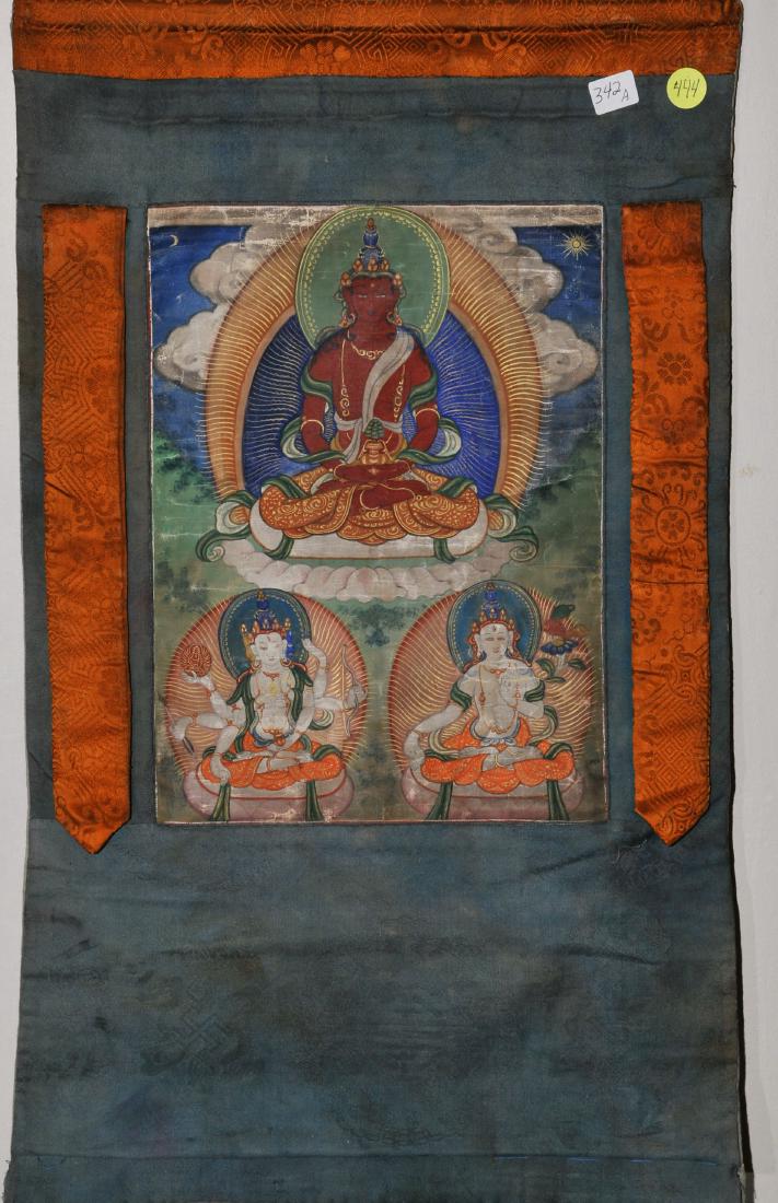 Buddhist Icon Thangka. Tibet. 19th century. Distemper.: Buddhist Icon Thangka. Tibet. 19th century. Distemper on heavy cloth. Triad of Amytaus, Shadakhsharilokeshvara and the White Tara. 12" x 9". Brocade mounts. For additional and high-resolution images, 