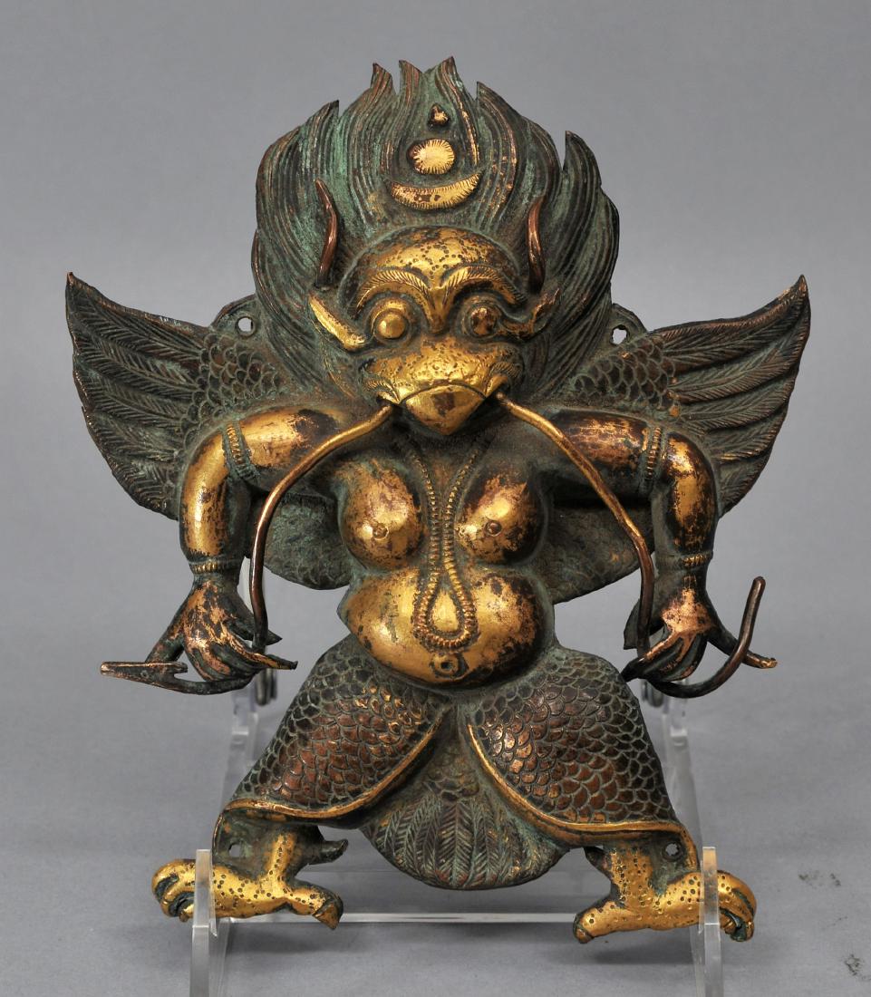 Gilt repousse plaque. Tibet. 19th century or earlier. (1 of 5)