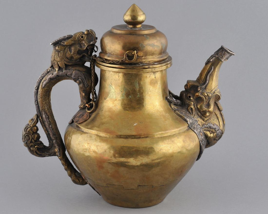 Teapot. Tibet. 19th century. Brass body with silver (1 of 11)