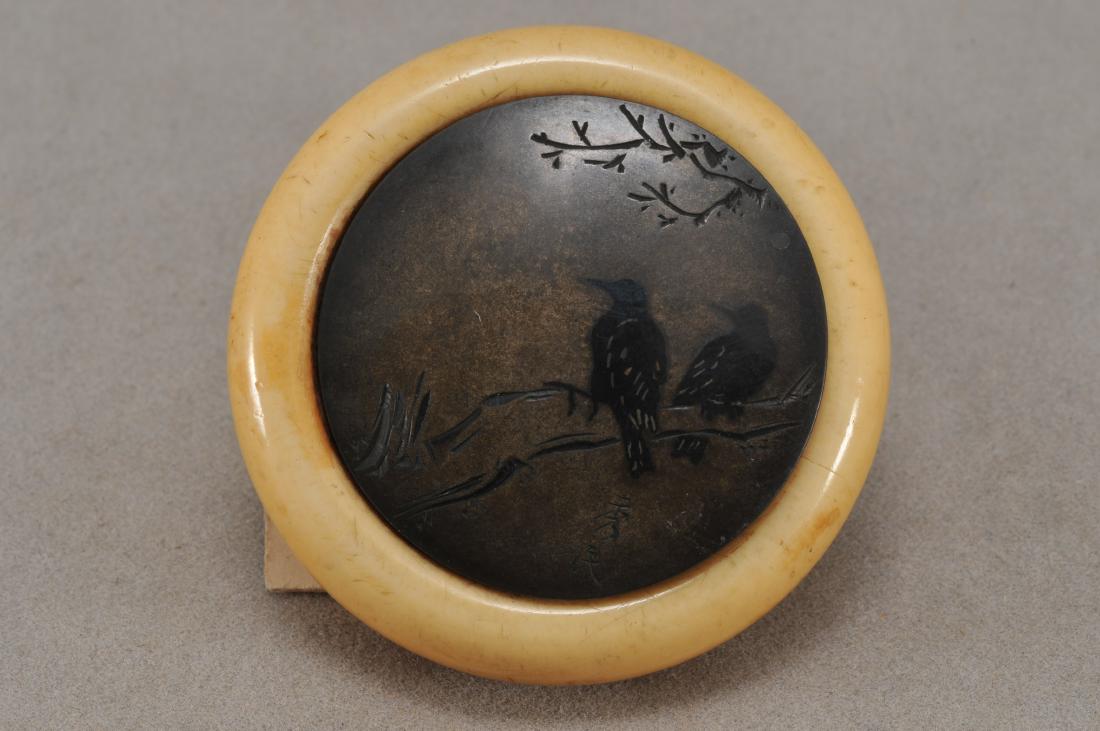 Kagamibuta Netsuke. Japan. 19th century. ALERT!: Kagamibuta Netsuke. Japan. 19th century. Mixed metal work of two ravens and barren branches. 1-1/2". All items in session one were collected by William H. Smith (1853-1923)) ALERT!!! ONLY THE CENTRAL 