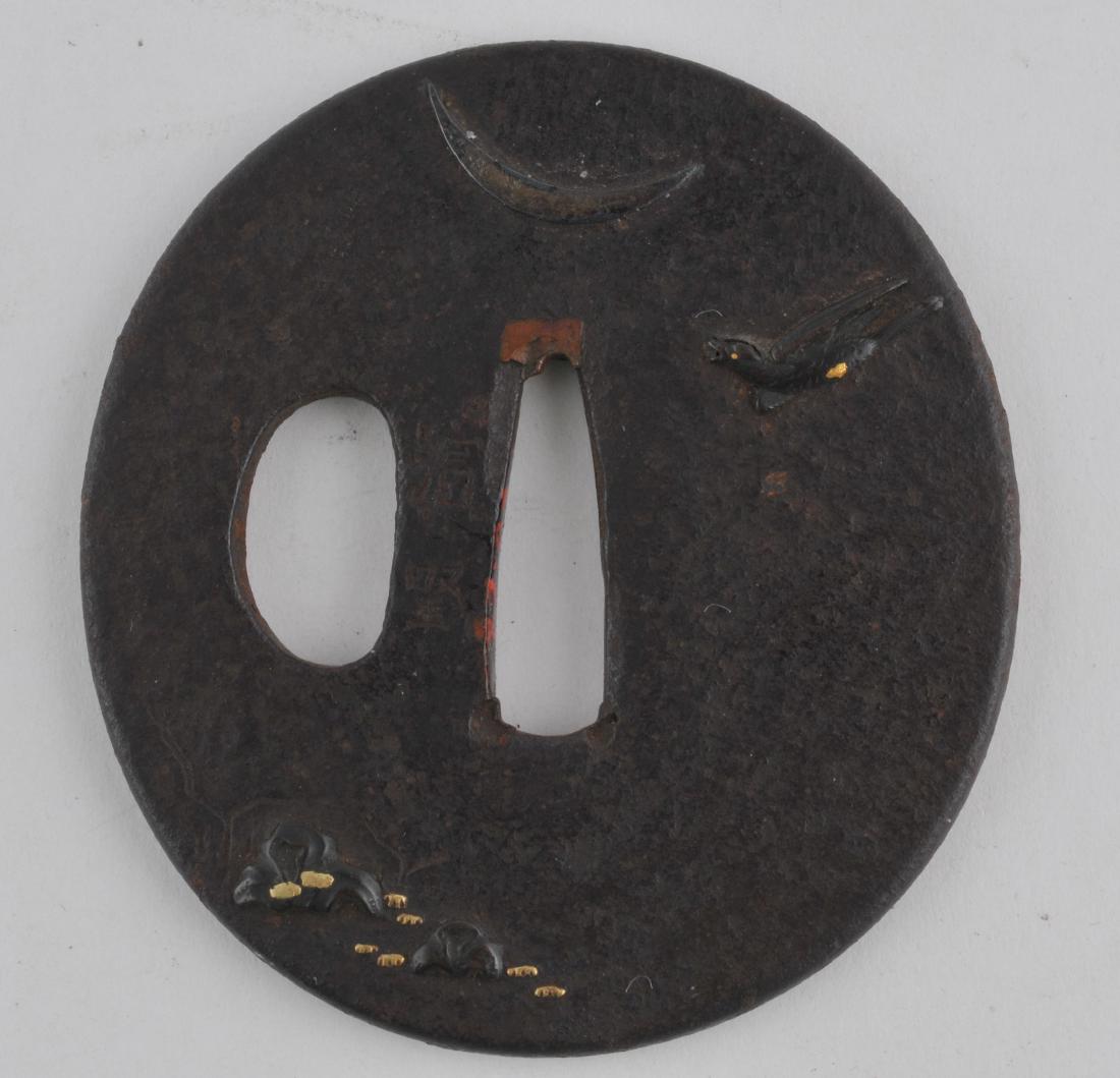 Handguard. Japan. 18th century. Iron with mixed metal: Handguard. Japan. 18th century. Iron with mixed metal inlay of geese and a crescent moon. 2-1/2". All items in session one were collected by William H. Smith (1853-1923)