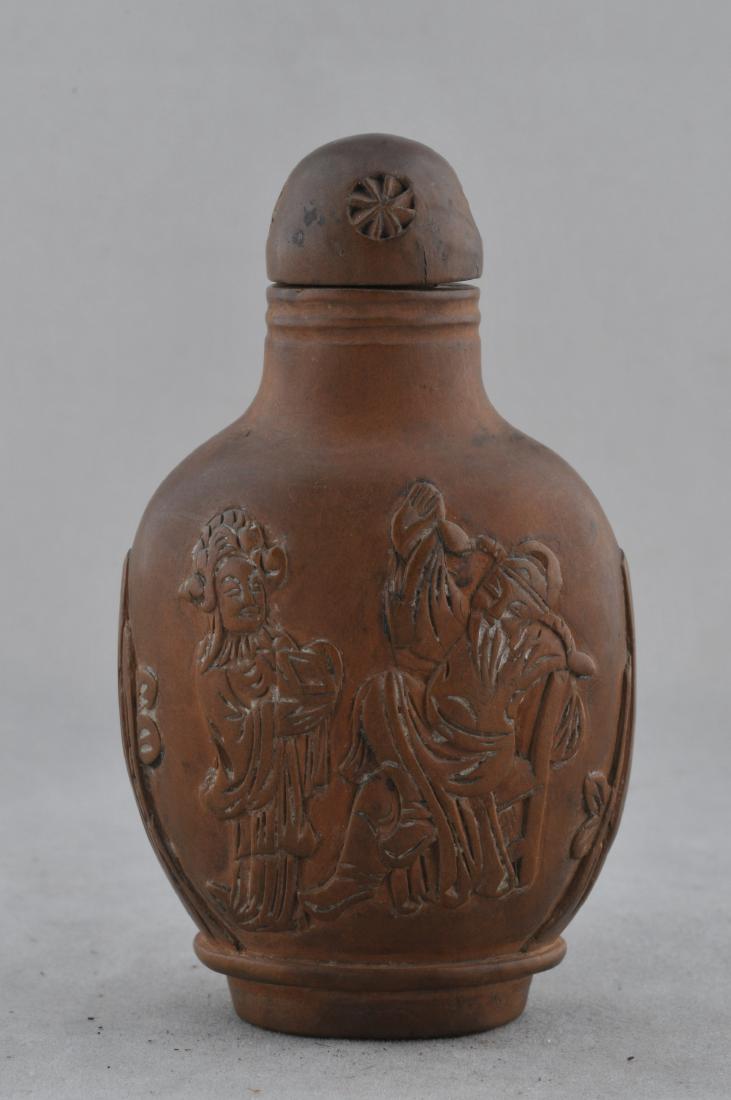 Carved wooden snuff bottle. China. 19th century.: Carved wooden snuff bottle. China. 19th century. Surface carved in relief with scenes from the life of the T'ang poet Lipo. 3". All items in session one were collected by William H. Smith (1853-1923)