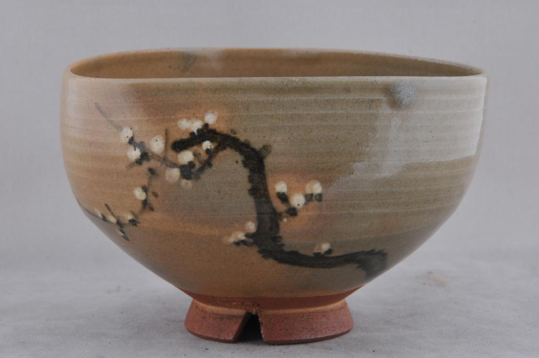 Tea bowl. Japan. Meiji period. (1868-1912). Triangular: Tea bowl. Japan. Meiji period. (1868-1912). Triangular mouth. Decoration of prunus branch. Signed with a seal. 4-1/2". All items in session one were collected by William H. Smith (1853-1923)