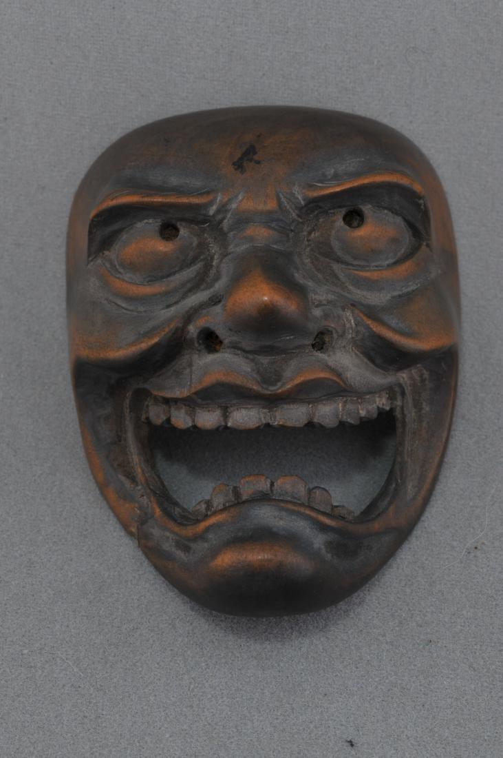 Carved wooden Netsuke.Japan. Mask. 19th century. 2".: Carved wooden Netsuke.Japan. Mask. 19th century. 2". All items in session one were collected by William H. Smith (1853-1923)