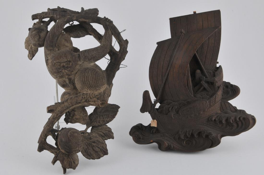 Two wood carvings. Japan. 19th century. A monkey with (1 of 10)