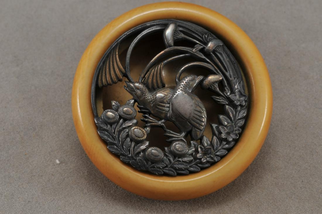 Kagamibuta Netsuke. Japan. 19th century. ALERT!: Kagamibuta Netsuke. Japan. 19th century. Gilt silver design of quails and millet plants. 2". All items in session one were collected by William H. Smith (1853-1923)) ALERT!!! ONLY THE CENTRAL INSERTED