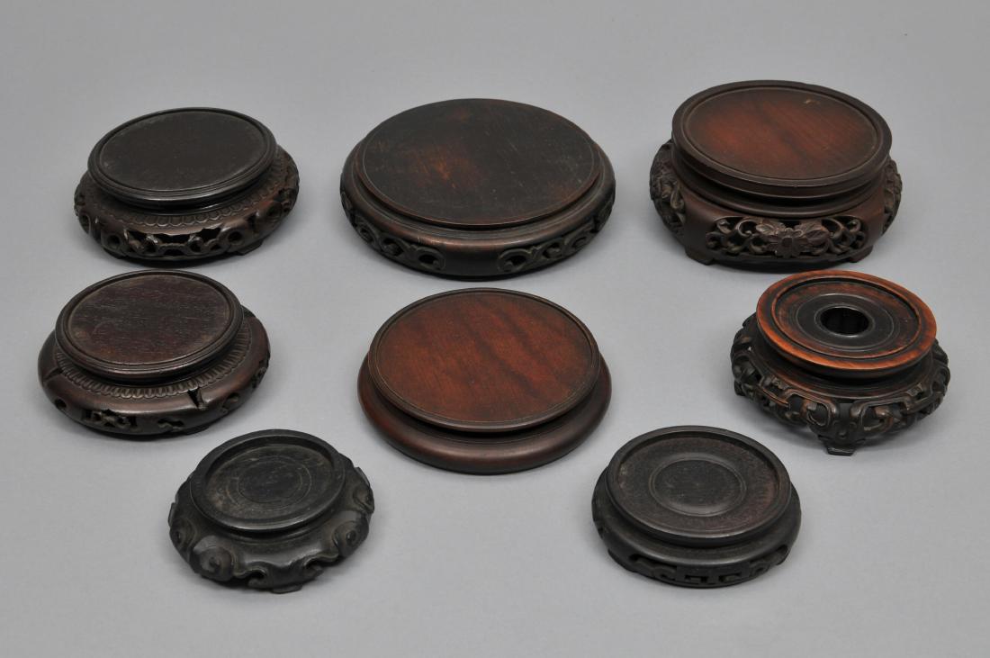Lot of eight carved hardwood stands. China. 19th (1 of 8)