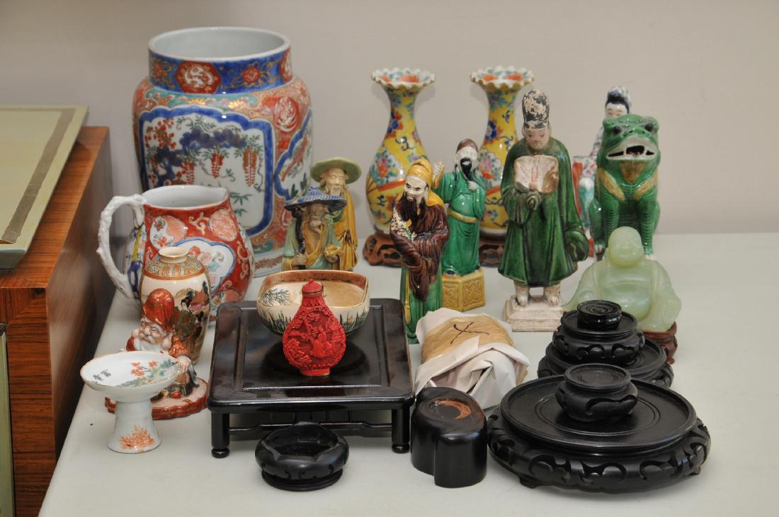 Lot of Asian porcelain and carved wood stands. (1 of 6)