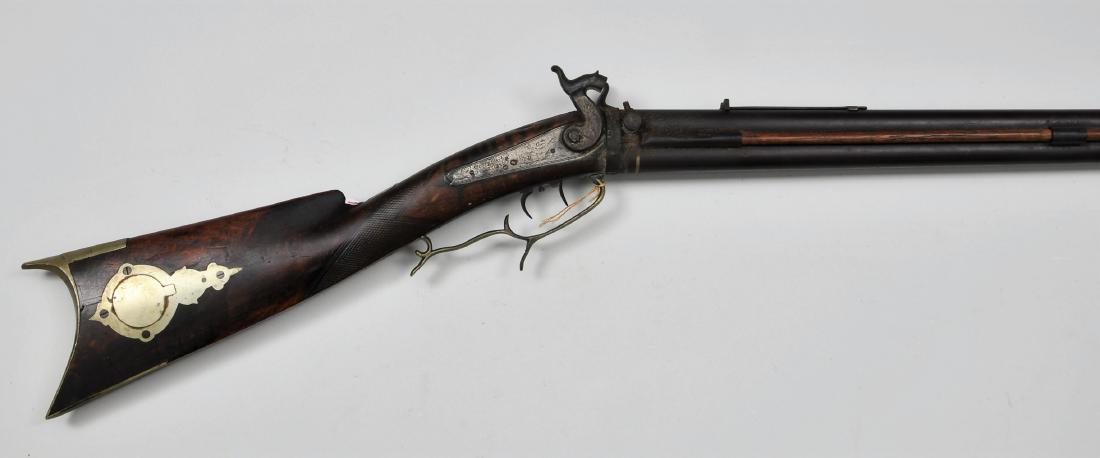 Buswell over under double barrel percussion gun.