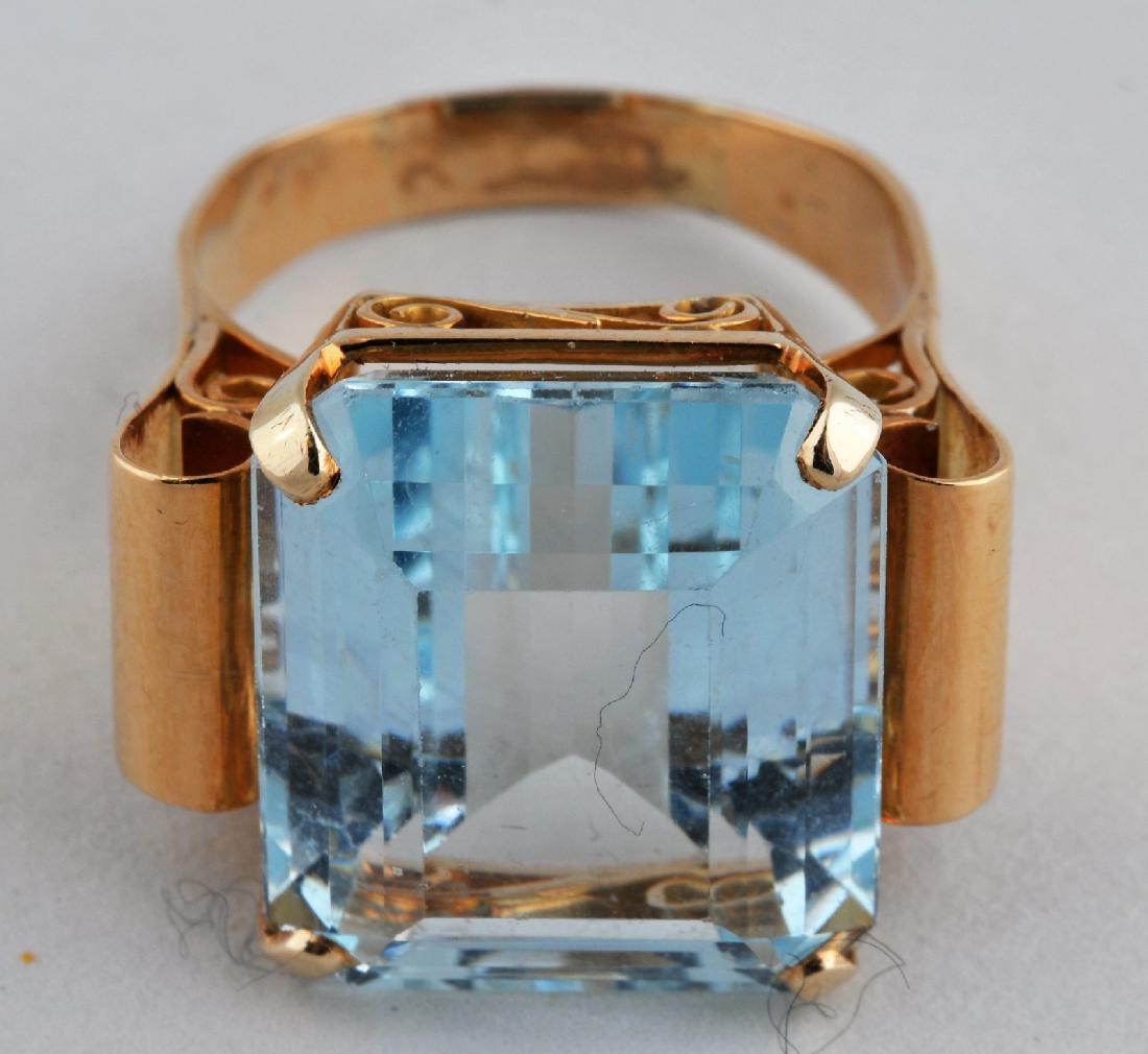 Large filigree design gold ring mounted with a pale (1 of 6)