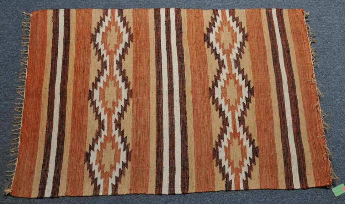 Vintage Rio Grande style carpet. Wood rod for hanging.: Vintage Rio Grande style carpet. Wood rod for hanging. 64" x 32".