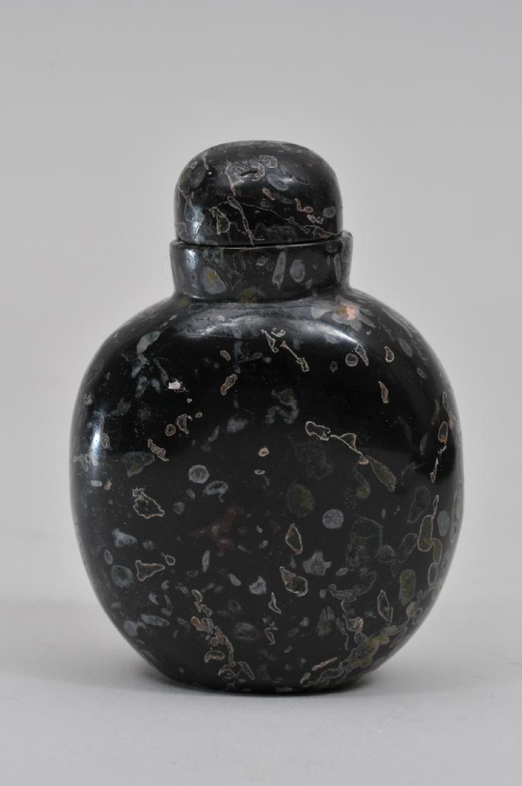 Snuff bottle. China. 19th century. Purple pudding stone (1 of 6)