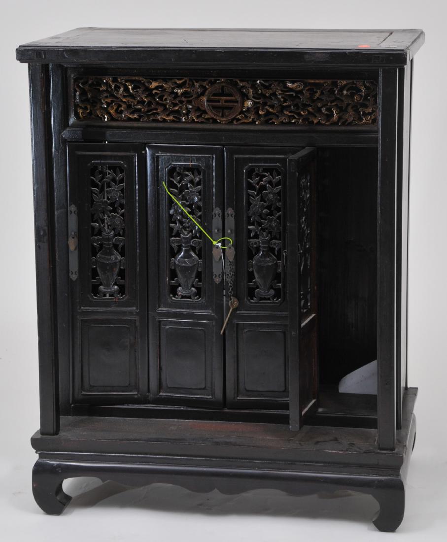 Household altar. China. 19th century. Carved and gilded: Household altar. China. 19th century. Carved and gilded with archaic dragon scrolling, birds and flowers. 33" high. 26" wide. 16" deep.