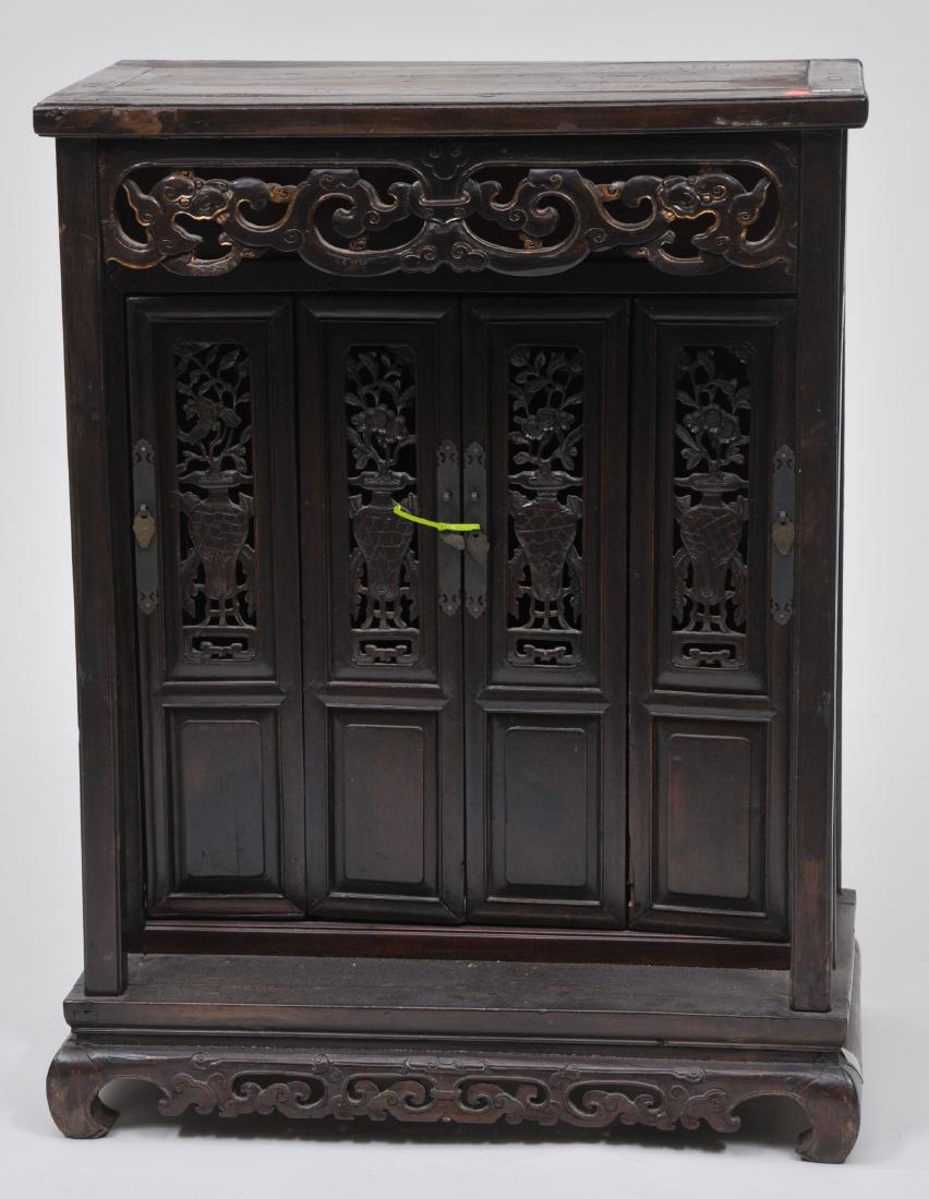 Household altar. China. 19th century. Carved and gilded: Household altar. China. 19th century. Carved and gilded with archaic dragon scrolling, birds and flowers. 31" high. 23" wide. 14" deep.