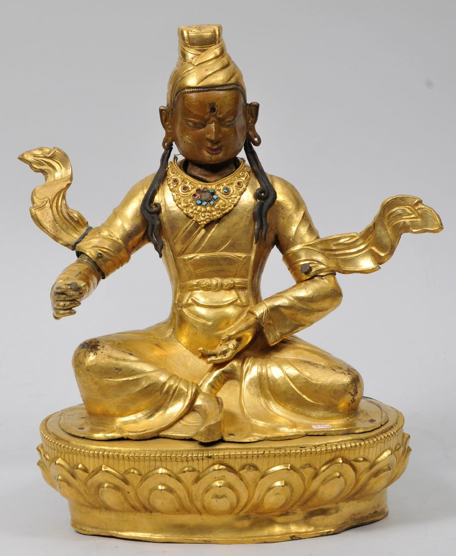 Repousse gilt copper image. Tibet. 19th century. Seated (1 of 10)