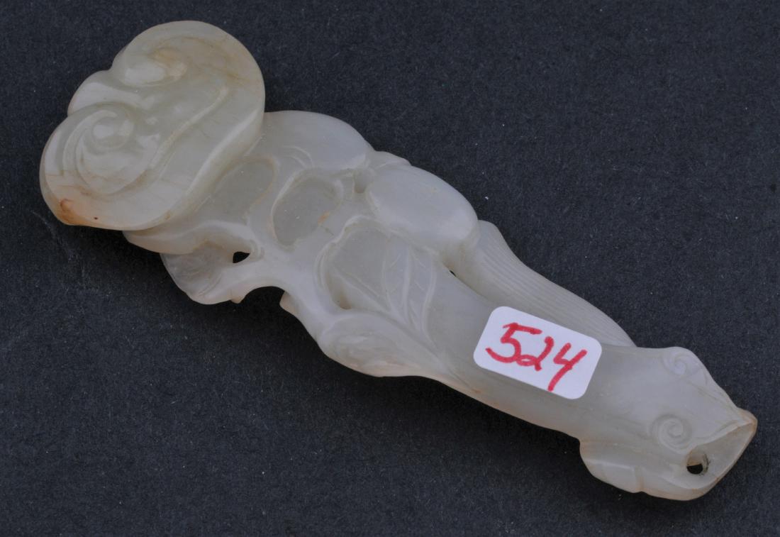 Jade pendant. China. 19th century. White stone. Shaped (1 of 3)