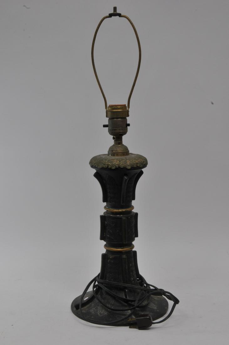 Bronze vase. China. 19th century. Archaic style Ku: Bronze vase. China. 19th century. Archaic style Ku beaker. 11". Drilled and mounted as a lamp.