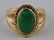 18k yellow gold ring, with oval green jade. Jade