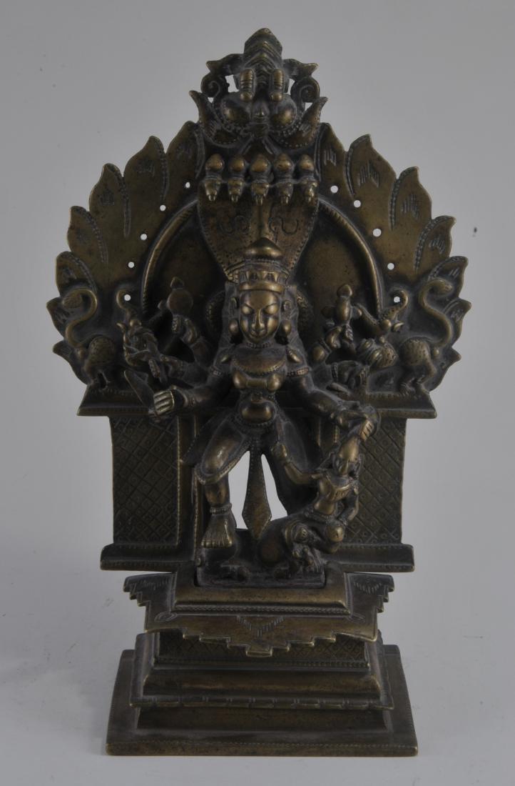 Bronze Altar piece. India. 17th century. Enthroned: Bronze Altar piece. India. 17th century. Enthroned image of Durga. 11" x 7".