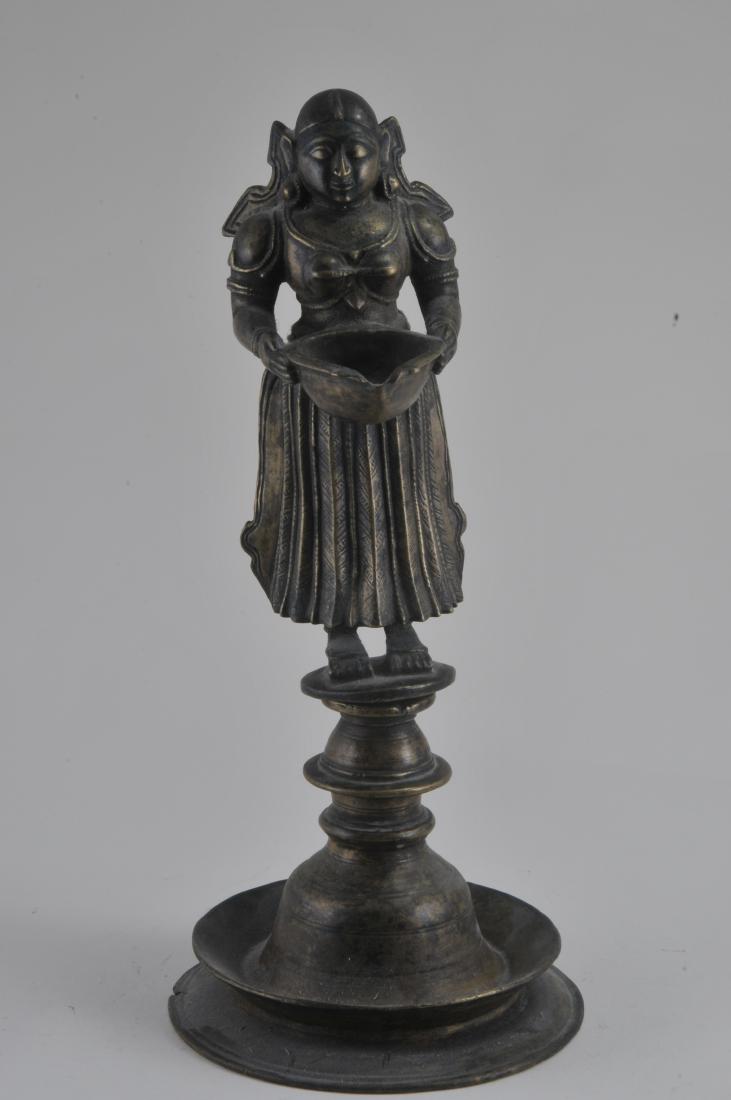 Bronze butter lamp. India. 18th century. Image of a (1 of 6)