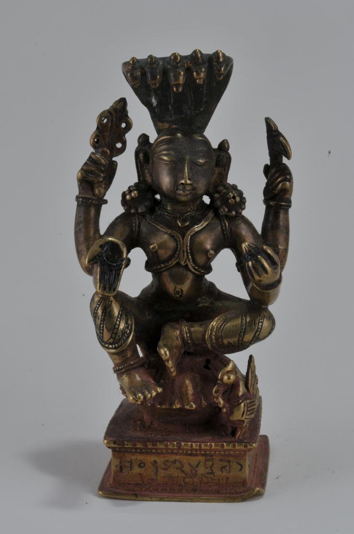 Bronze divinity. India. 18th century. Four armed figure (1 of 4)