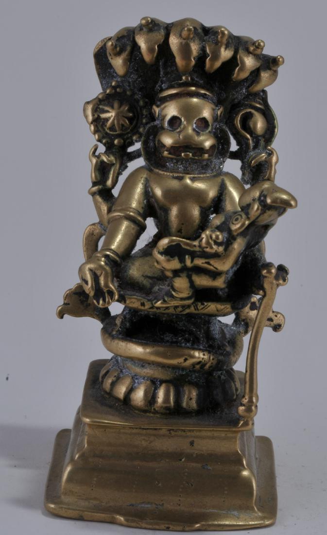 Bronze image. Enthroned image of Narasimha with (1 of 5)