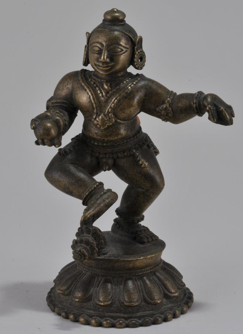 Bronze deity. India. 18th century. Dancing figure of (1 of 4)
