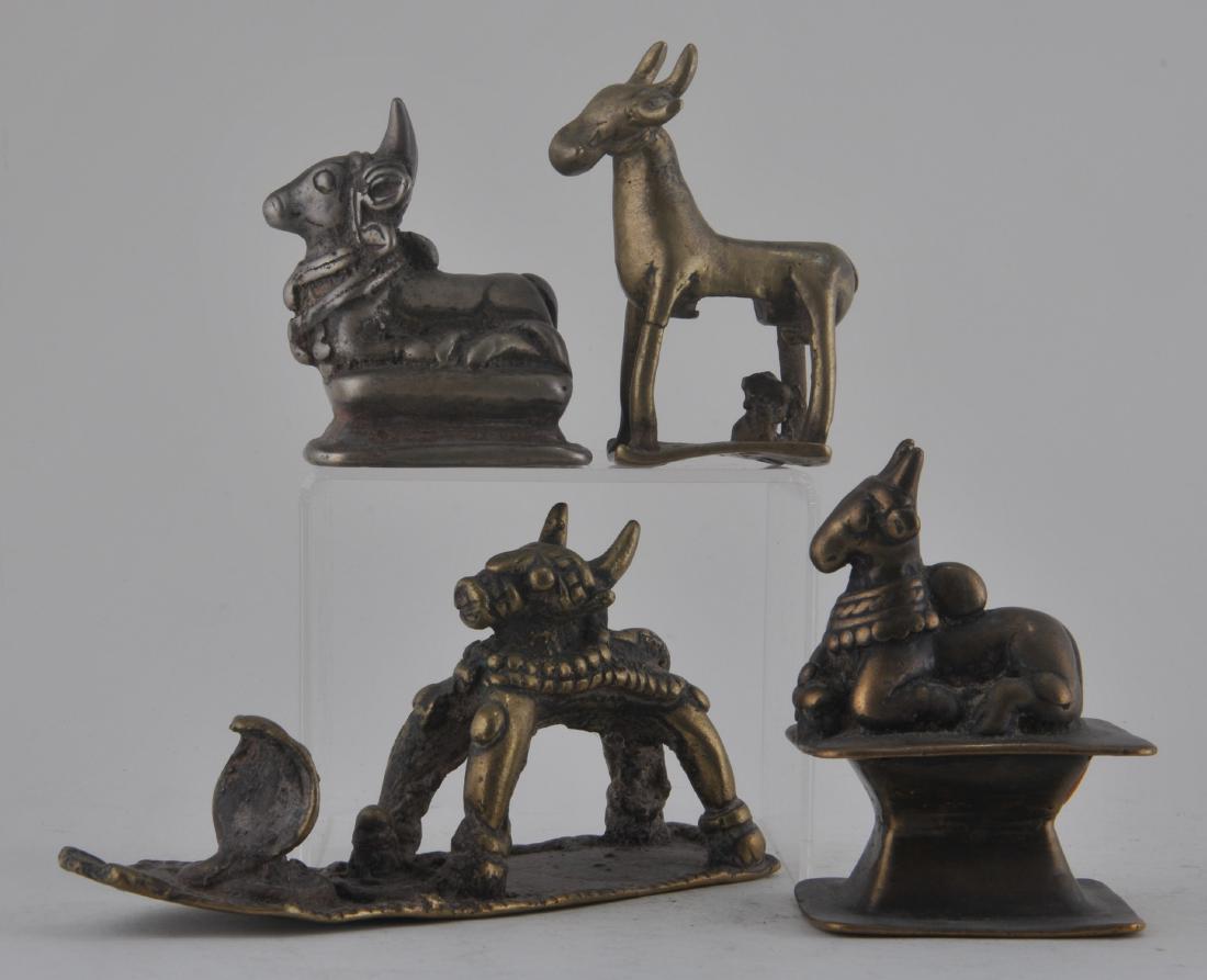 Lot of four bronzes. India. 19th century and earlier. (1 of 4)