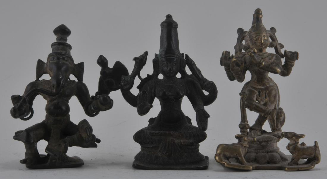 Lot of three bronze figures. India. 19th century and (1 of 4)