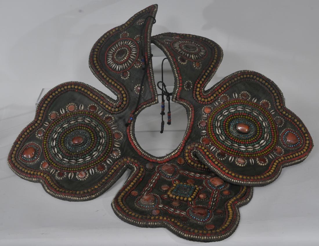 Collar. Tibet. Early 20th century. Textile set with (1 of 8)