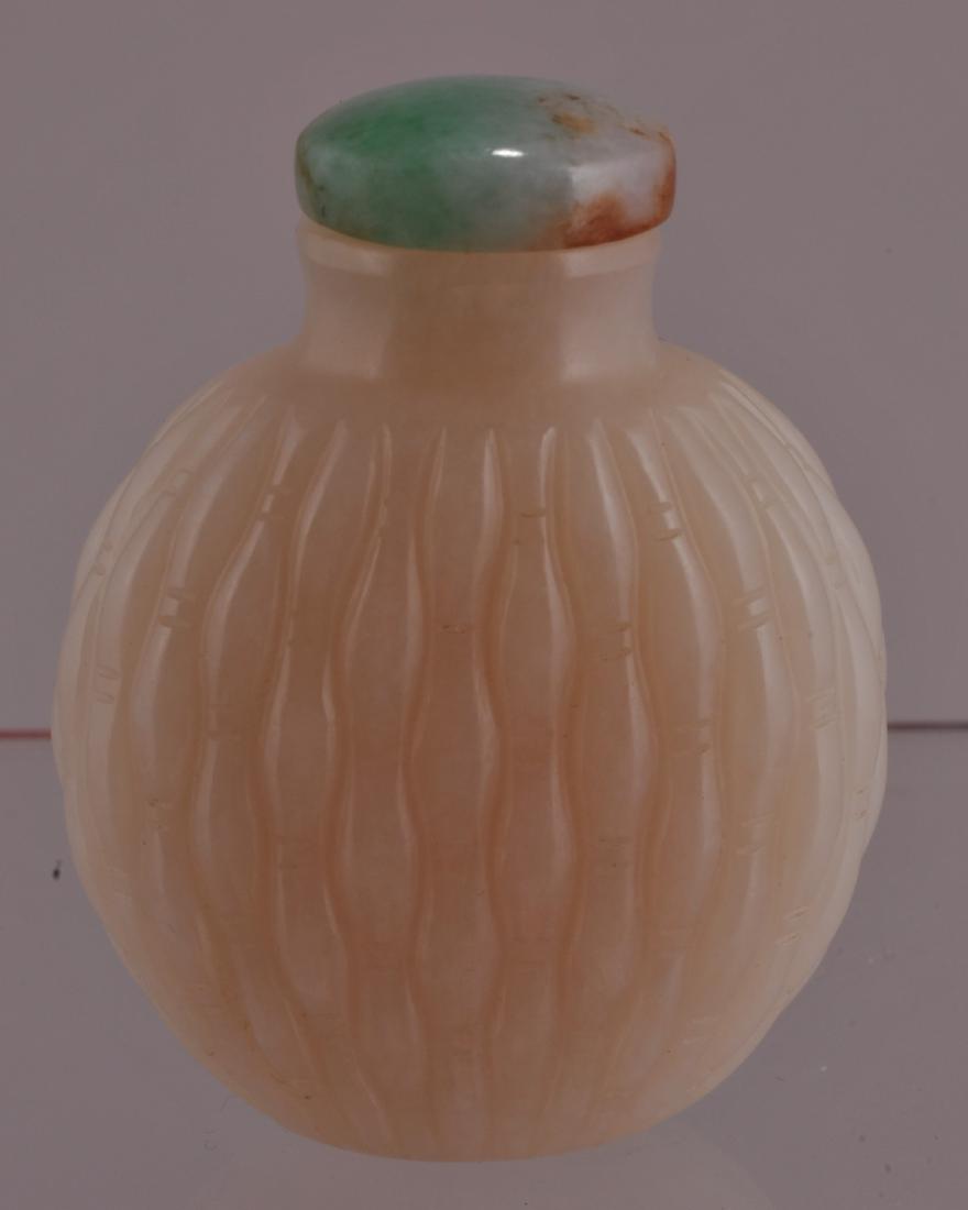 Jade snuff bottle. China. 19th century. White stone (1 of 4)