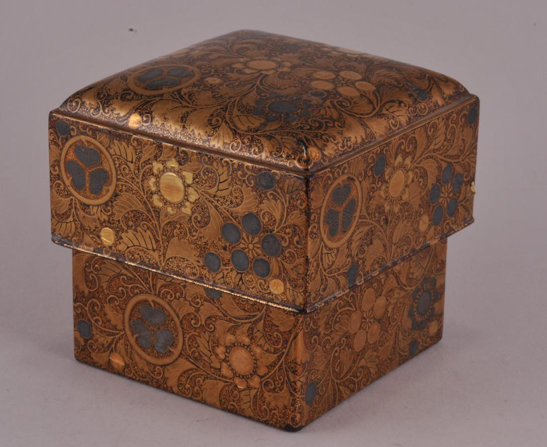 Lacquered box. 19th century Togidashi ground with gold: Lacquered box. 19th century Togidashi ground with gold and silver lacquered Mon. 3" square.