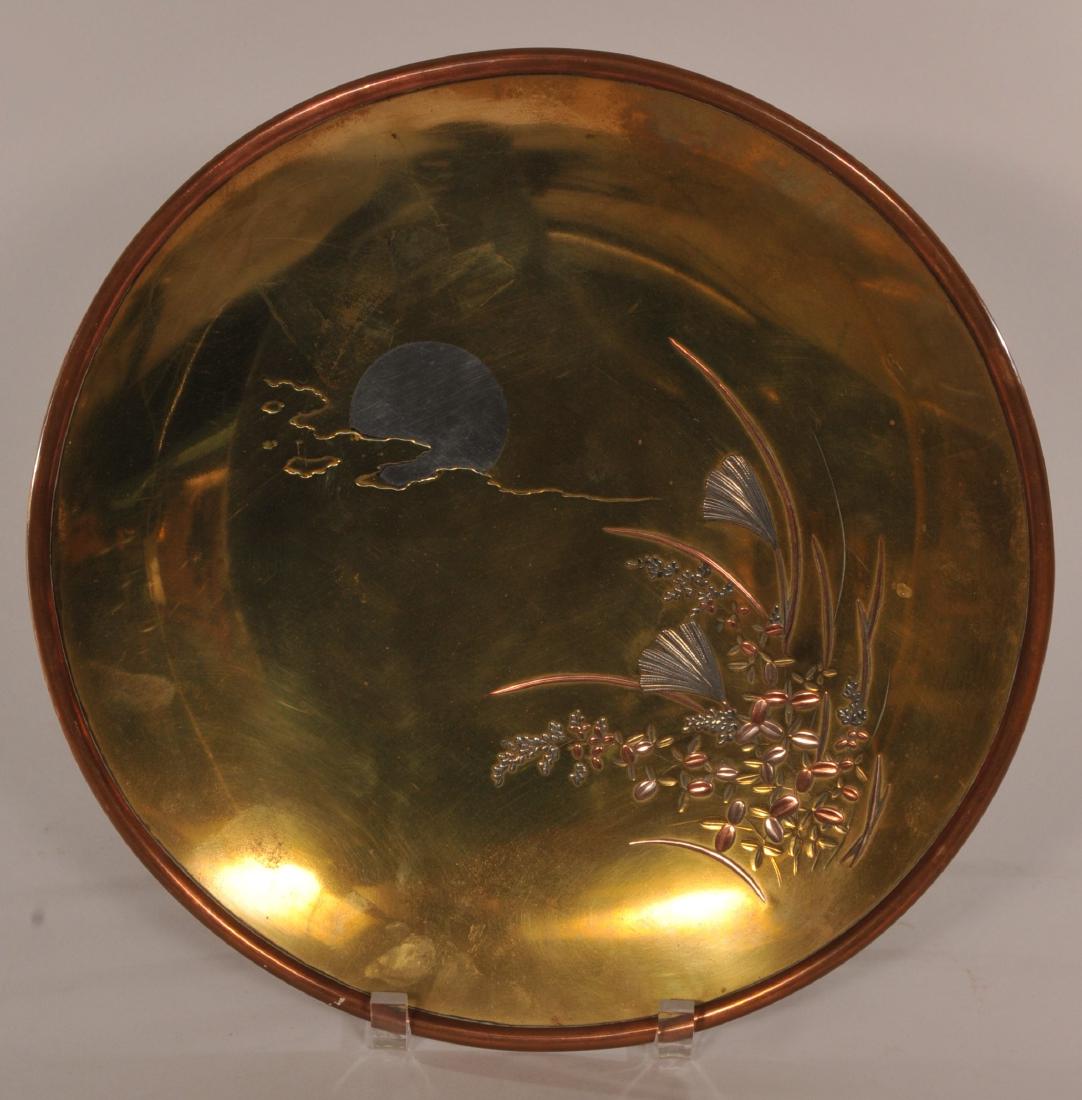 Mixed metals plate. Japan. Meiji period. (1868-1912): Mixed metals plate. Japan. Meiji period. (1868-1912) Decoration of the moon and autumn grasses. Signed. 12-1/4" diameter. 1-1/2 high.