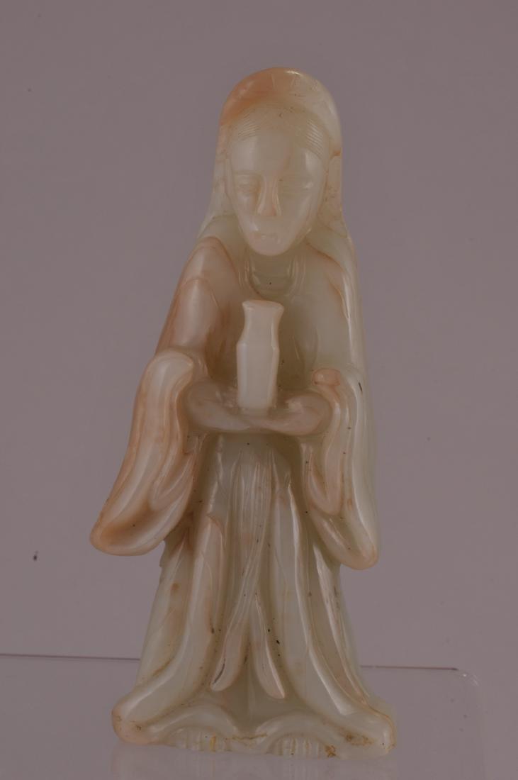 Jade carving. China. 19th century. Standing figure of (1 of 6)