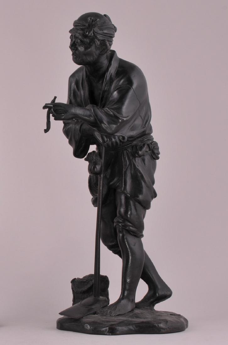 Bronze sculpture. Japan. Meiji period. (1868-1912): Bronze sculpture. Japan. Meiji period. (1868-1912) -Figure of a peasant smoking. 12" high.